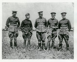 Black and white photo of five men in uniform from the 30th division company e.