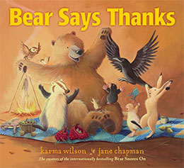 Book cover for the illustrated book Bear Says Thanks with a bear, badger, bird, rabbit, mole, and other animals with their arms raised.