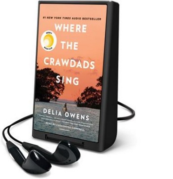 MP3 device with headphones that contains the audiobook for Where the Crawdads Sing.