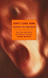 Blurry, close-up image of a screaming face in warm tones with an orange text box centered over the mouth.