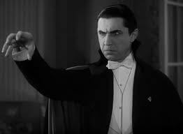 Film still shows a man dressed as Dracula.