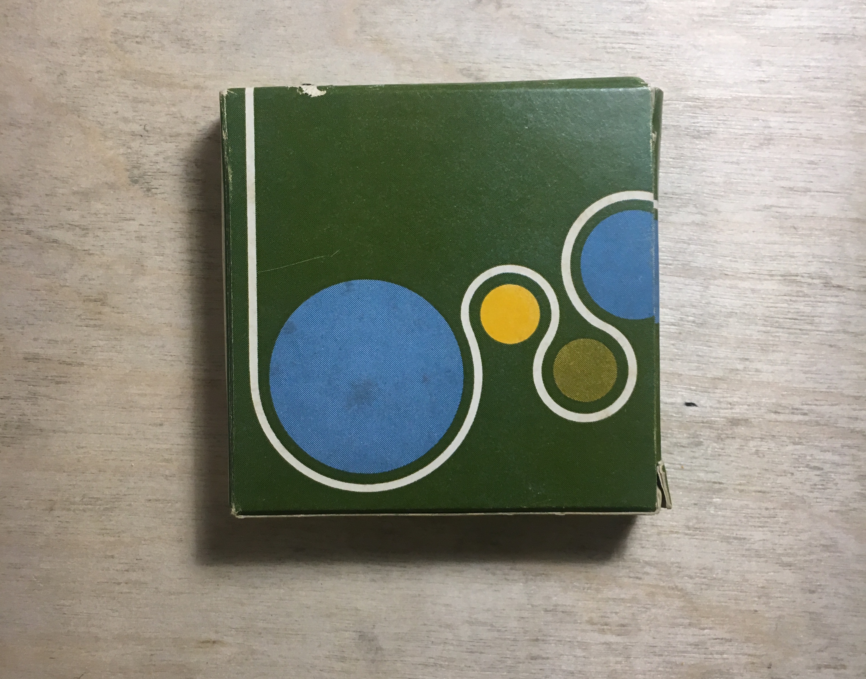 Green film container.