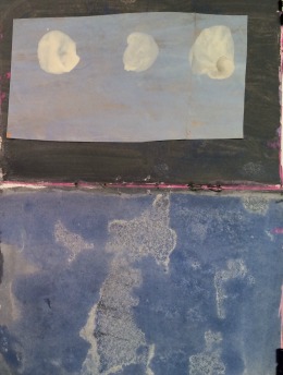 Artwork features a blue field underneath a framed box wth three white circles.