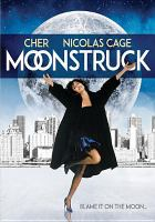 Movie poster for moonstruck. White woman in black coat is marching with arms outstretched.