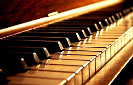 Piano keys in soft lighting.