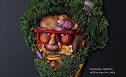 A portrait of a man with red glasses is artistically created using various vegetables like kale and red onions.