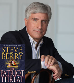 Steve Berry with his book The Patriot Threat.