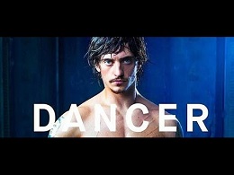 Image of a handsome man from the chest up with the word "DANCER" at the bottom.