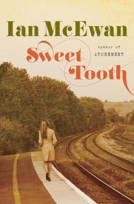 Book cover for Sweet Tooth by Ian McEwan shows a woman with long hair and a pale dress walking along a train track.