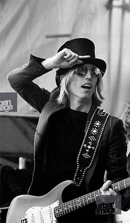 Tom Petty with guitar.