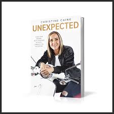 Book cover showing smiling blonde woman sitting on white motorcycle.