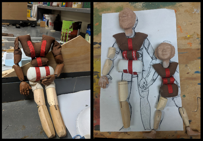 Three wooden figures used as models.
