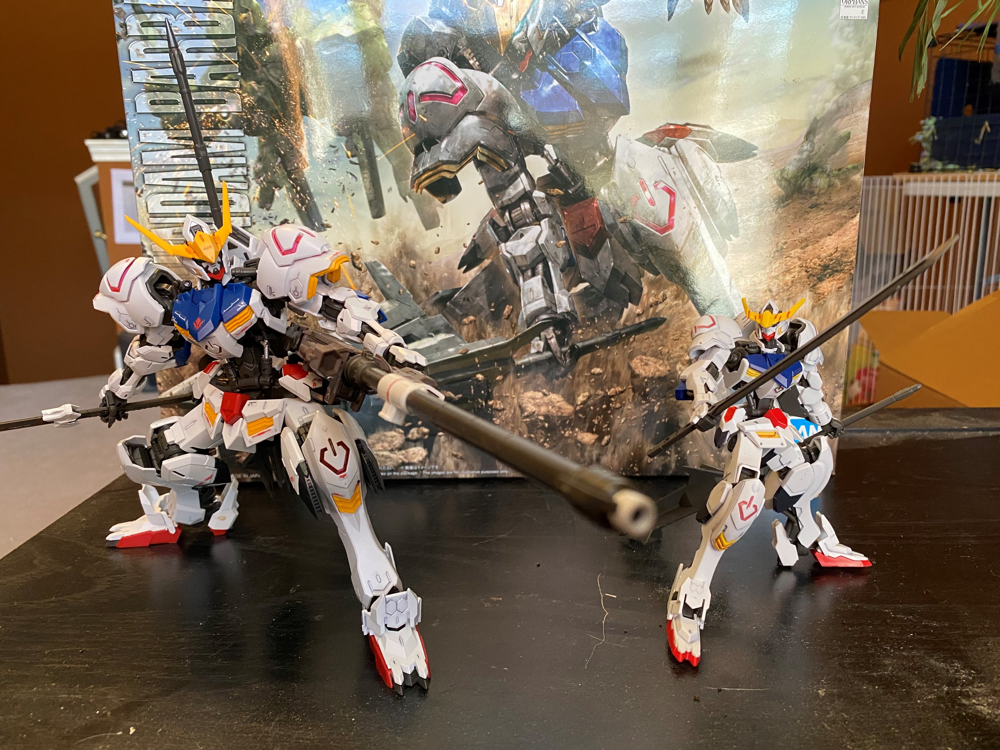 Two Gundam action figures. 