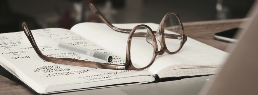 glasses on a book