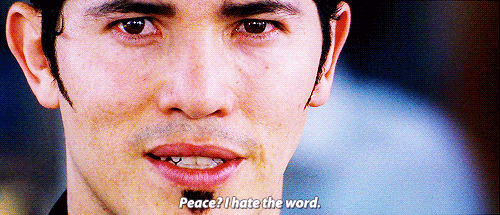 Animated gif of a man with dark hair and a soul patch saying "Peace? I hate the word."