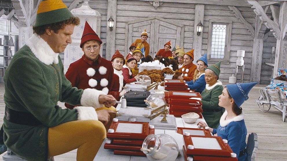 Buddy the Elf in the toy workshop from the movie Elf.