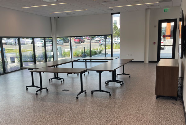 Meeting room with table and chairs.
