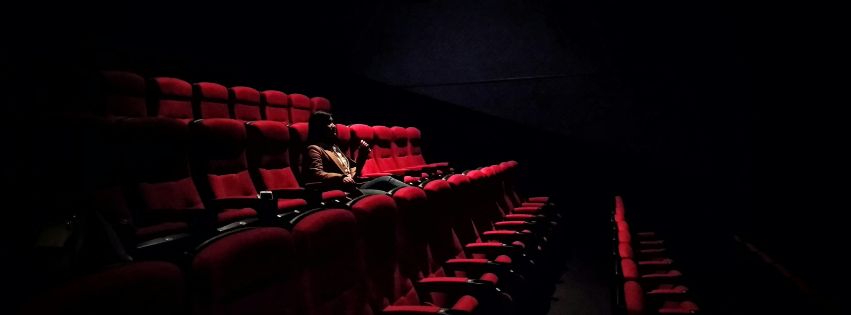 person in theater