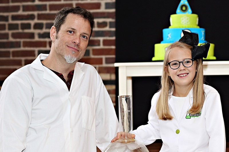 Mr. Bond the Science Guy with a young scientist
