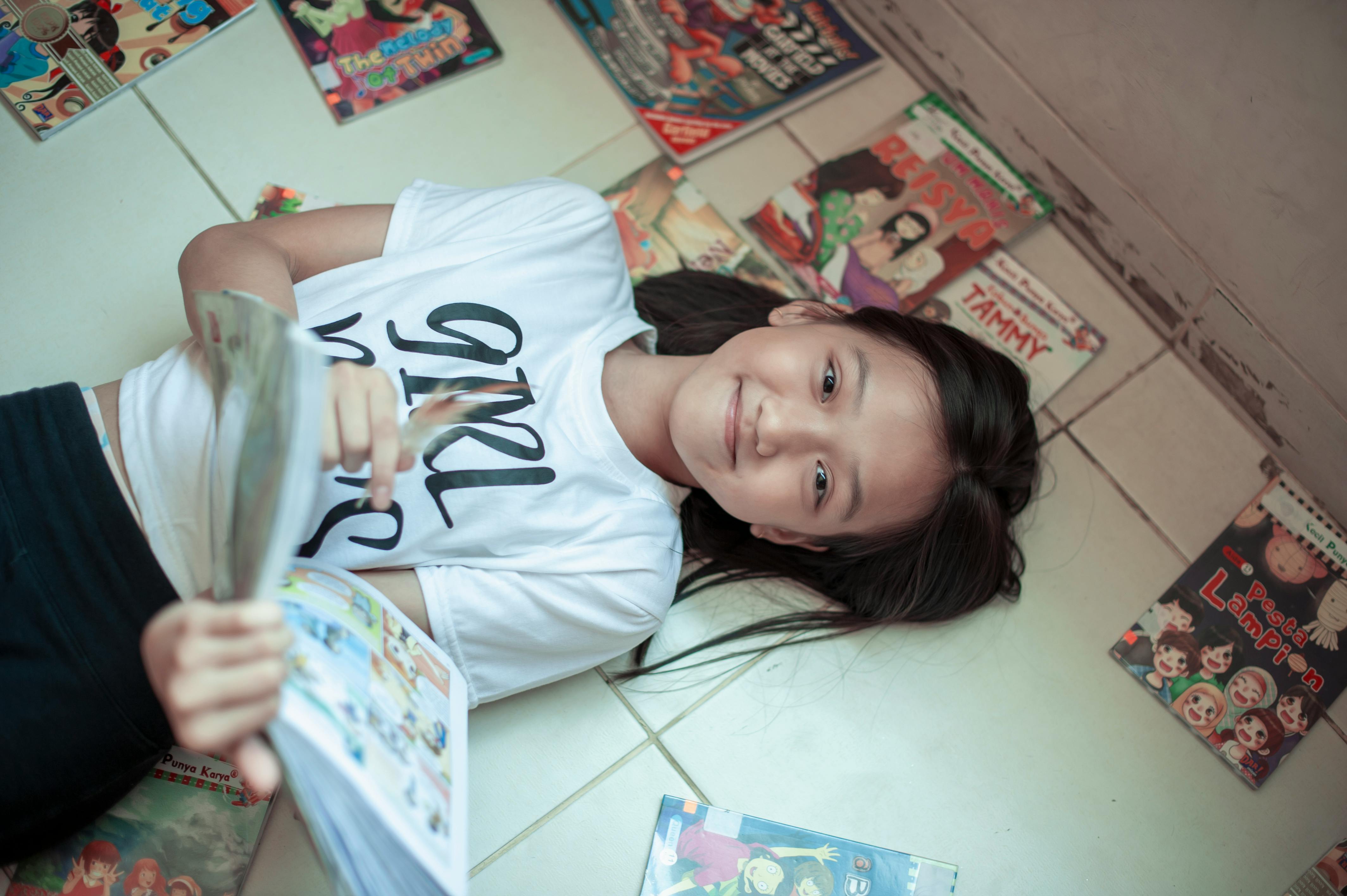 Child reading a graphic novel