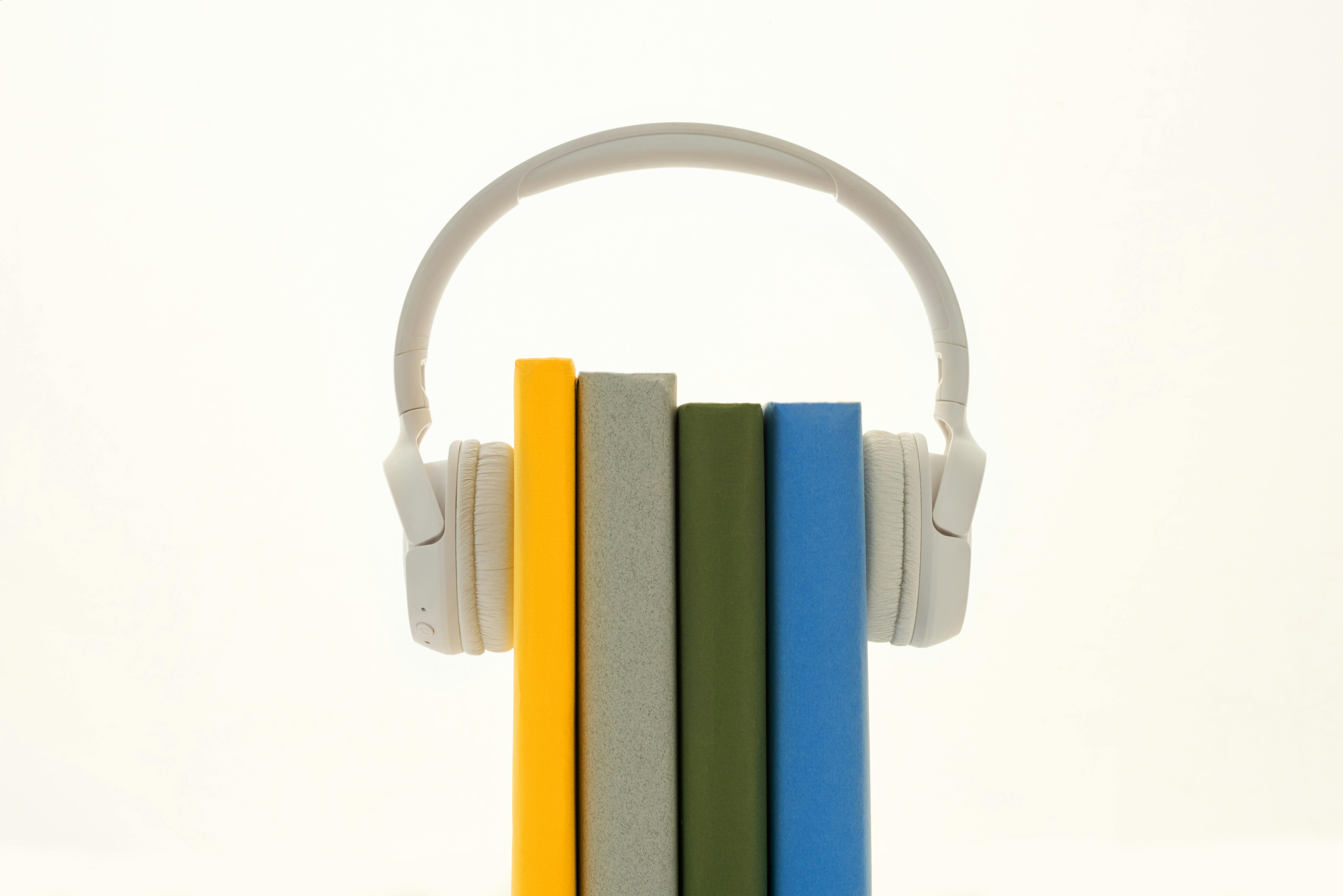 Headphones around books