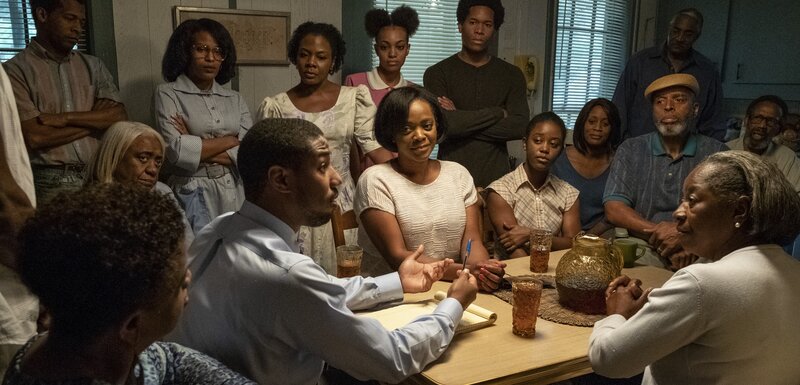 Michael B. Jordan speaks to a full room