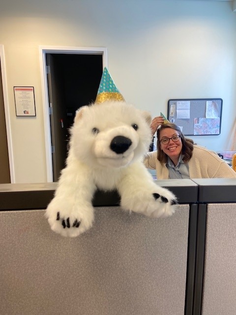Vanilla the polar bear toy with librarian Nikki.