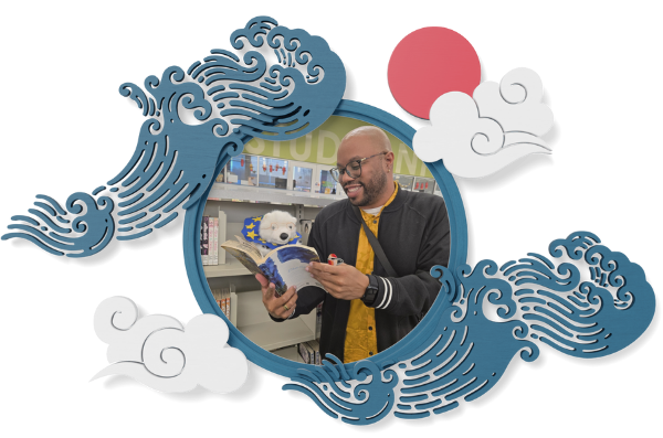 Vanilla and Jamal looking at a book