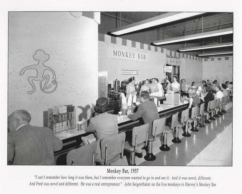 Photo of the monkey bar at Harvey's with people eating and staff behind the bar