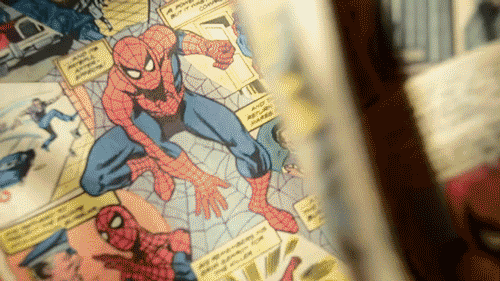 Animation showing someone flipping the pages of a comic book.