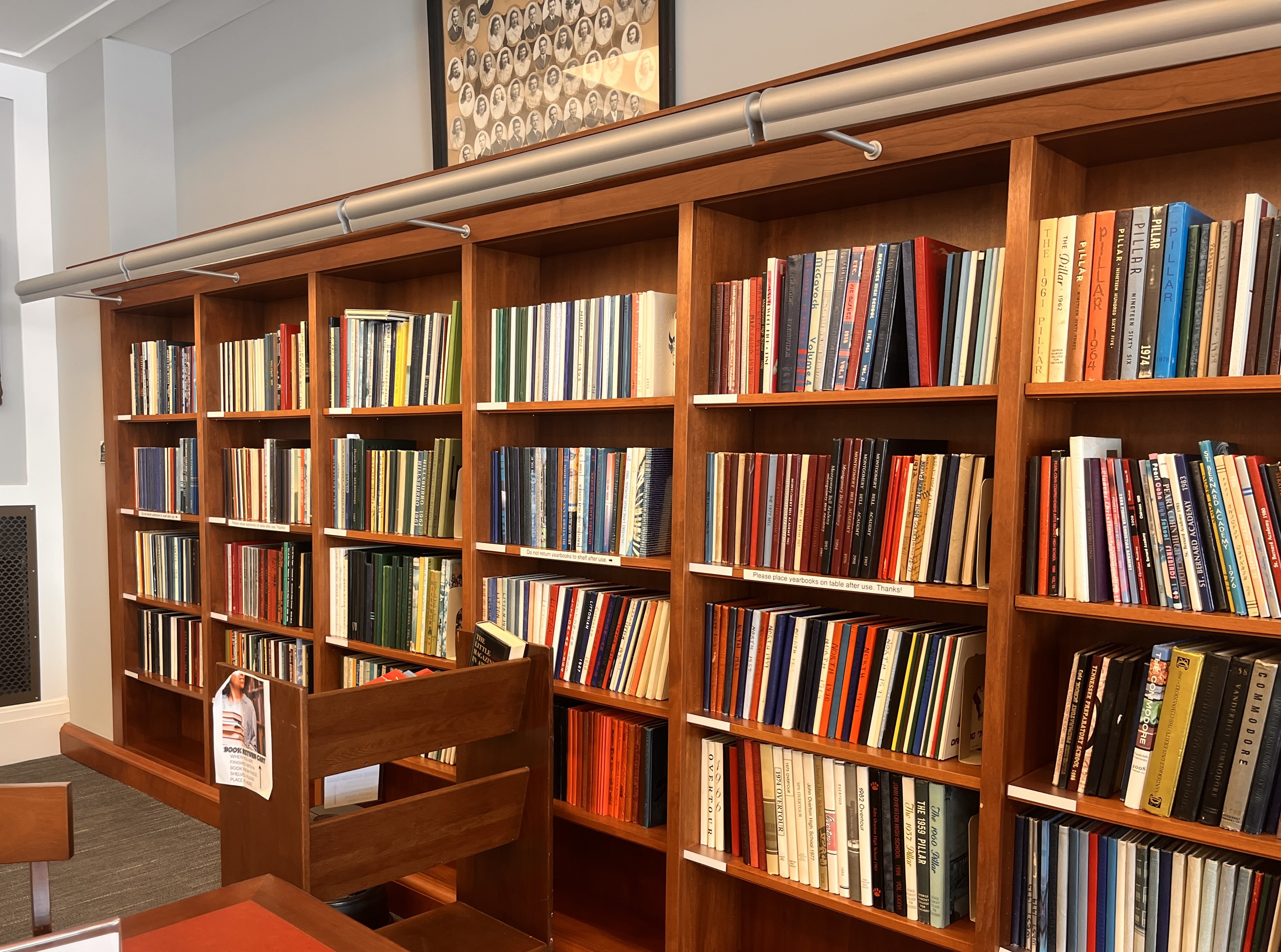 Photo of bookshelves containing nashville and davidson county yearbooks
