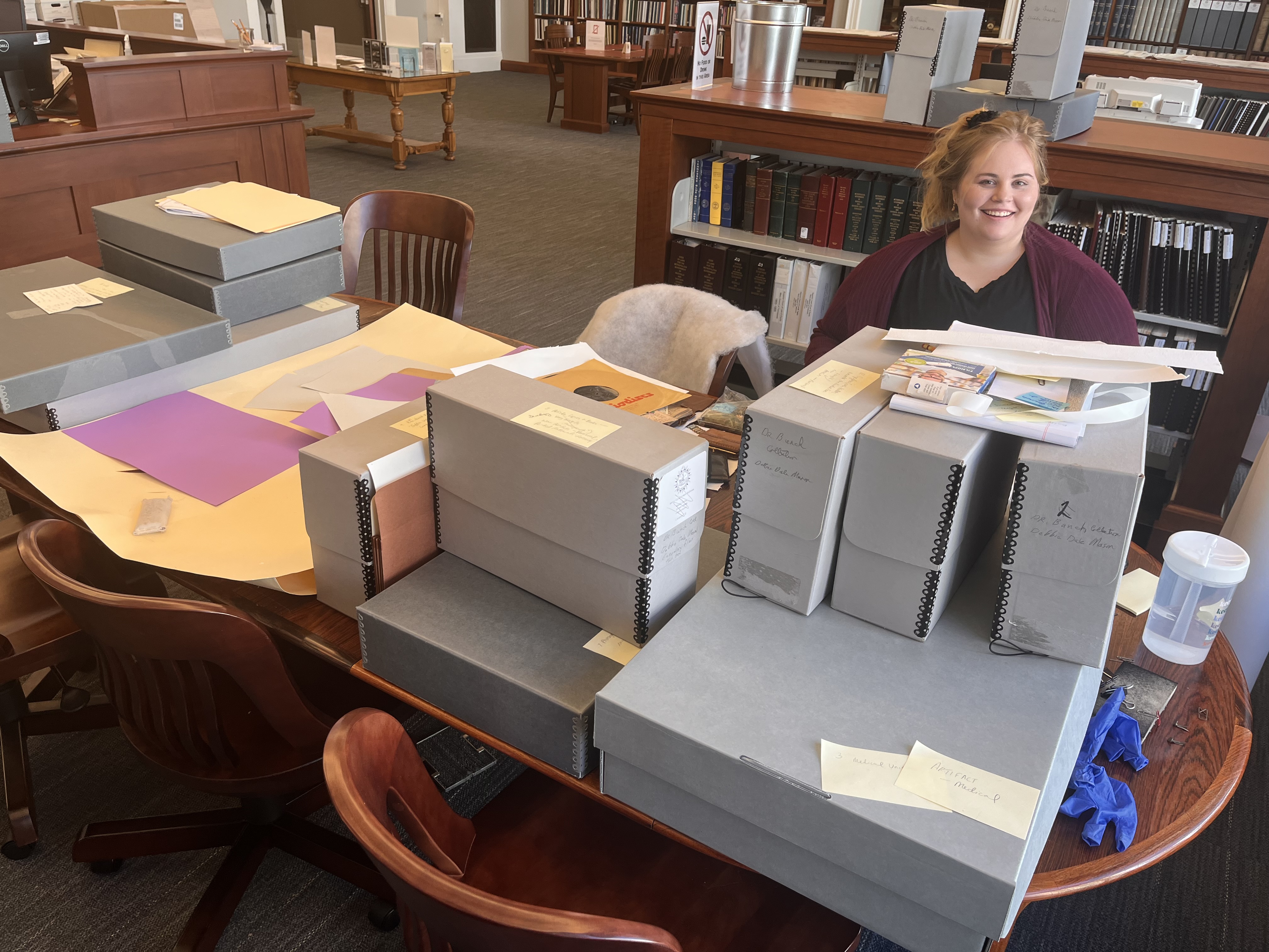 Archives intern Jamie at work