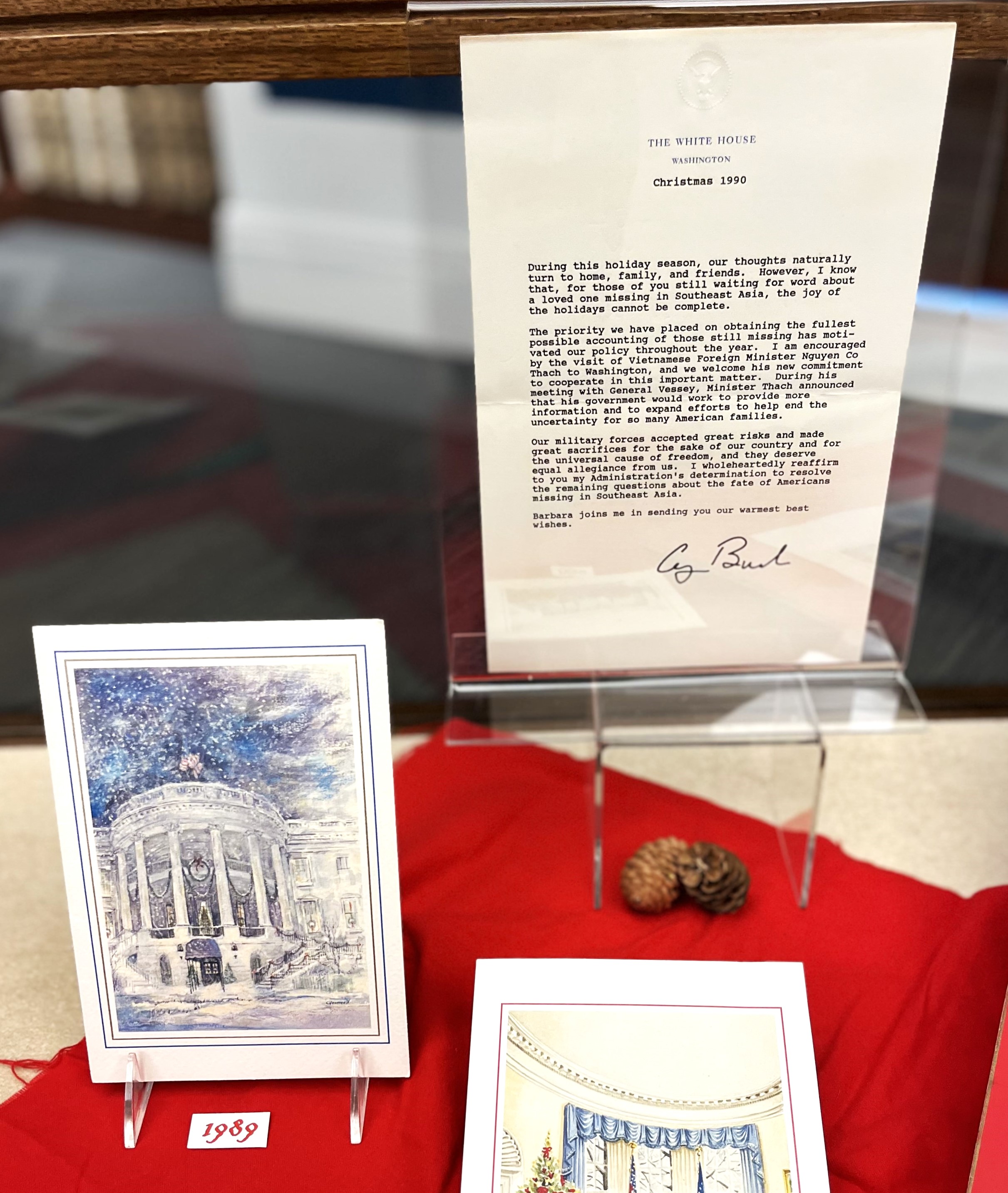 Display case with letter and Christmas card.