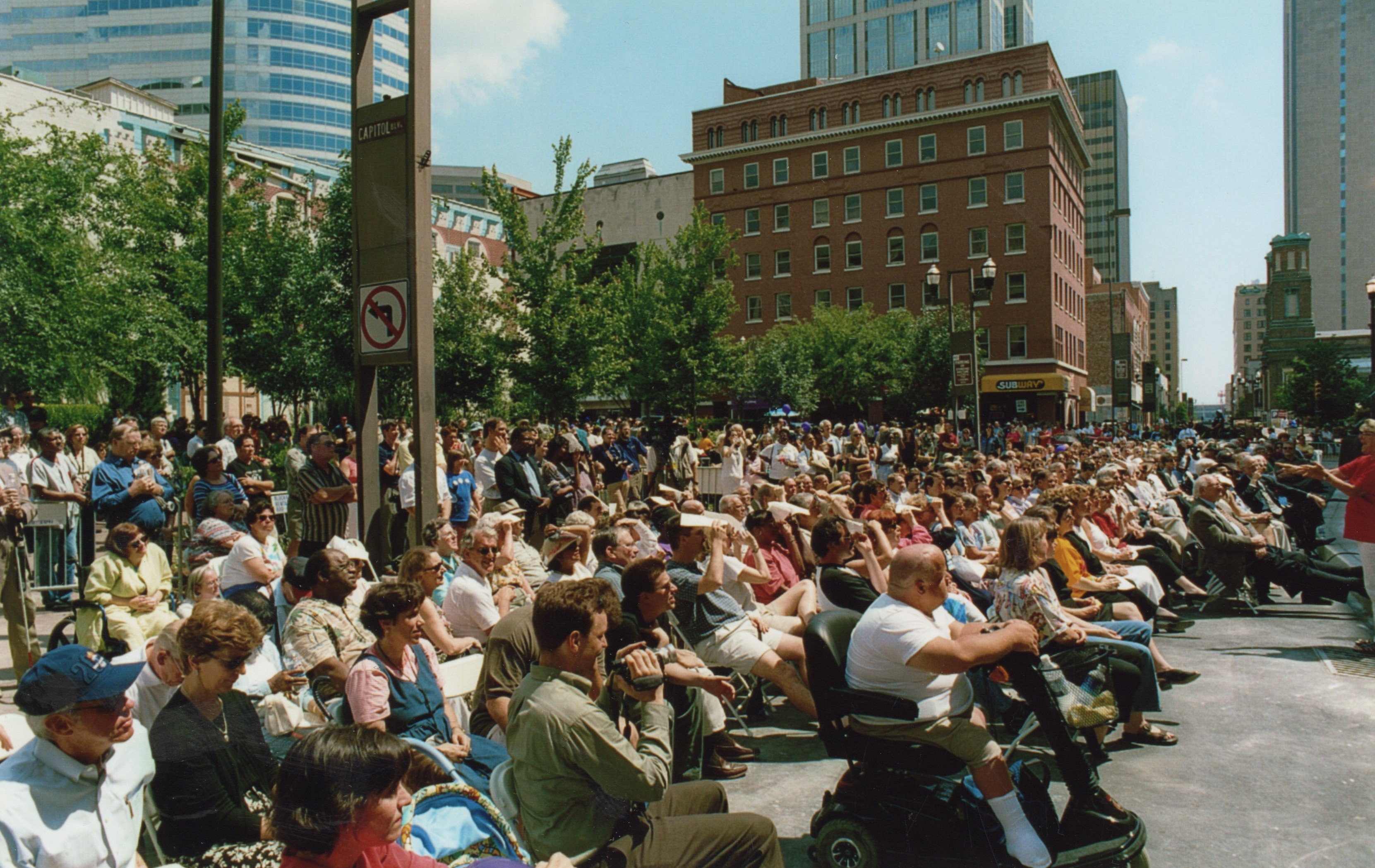 View of the large crowd outside the Main Library at the grand opening event