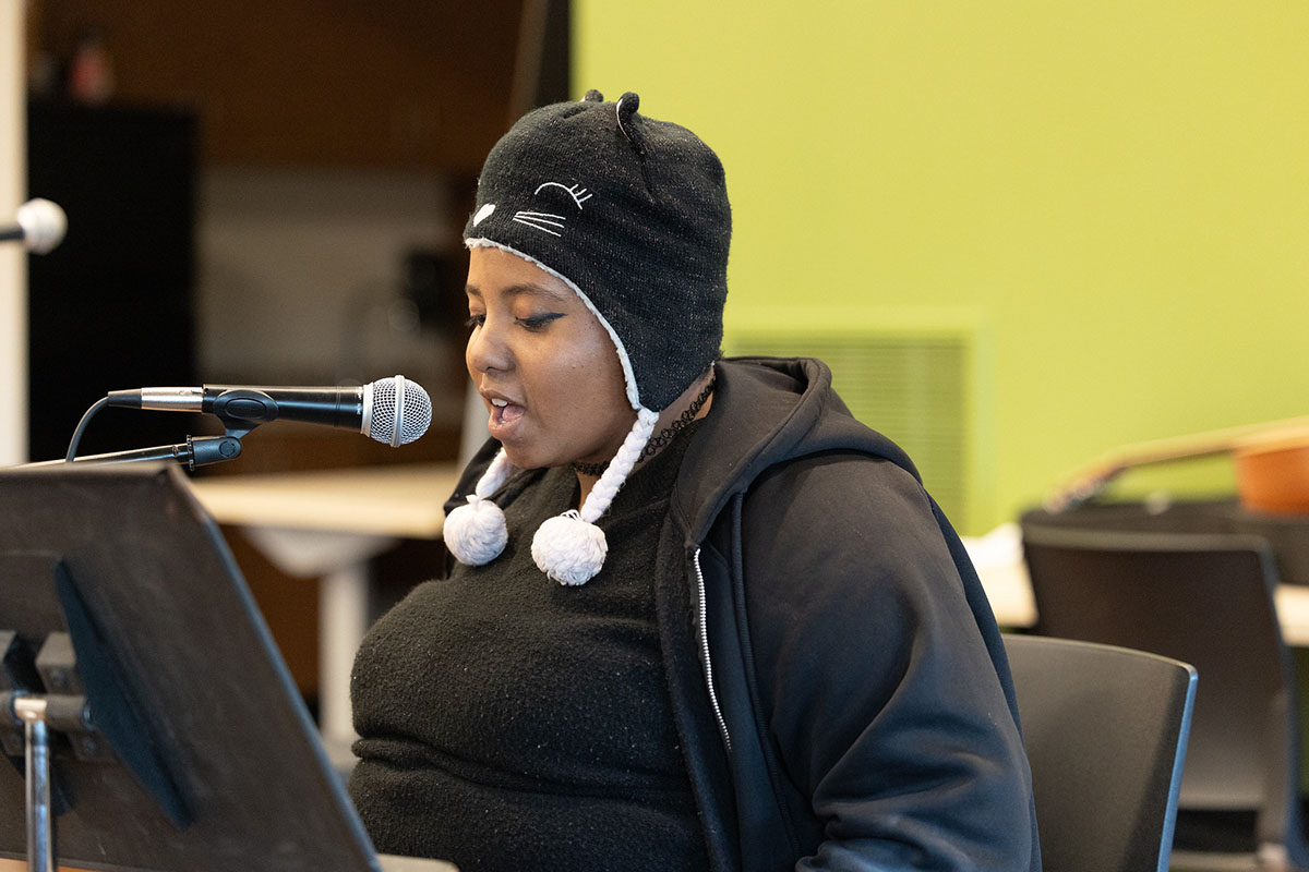 Singer at Quiet in the Library Open Mic