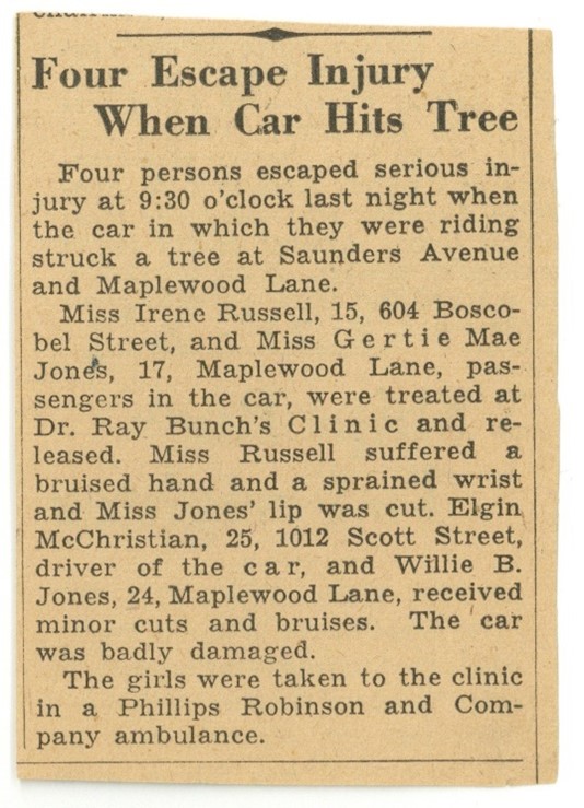 Newspaper clipping with headline "Four Escape Injury When Car Hits Tree"