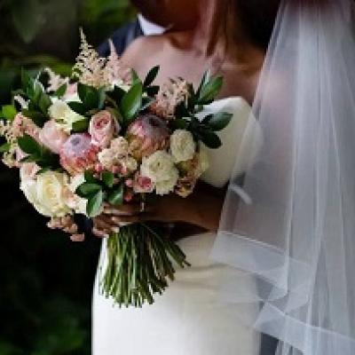 Pride with flower bouquet.