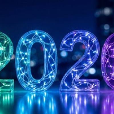 The number 2026 lit up with twinkle lights.