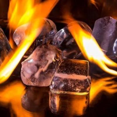 Ice cubes next to flames.