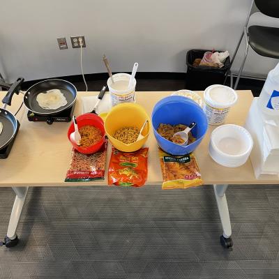 Table with fried eggs and toppings.