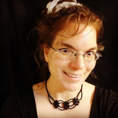 Headshot of Magda, a staff person at the library.