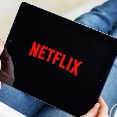 Netflix logo on a tablet.