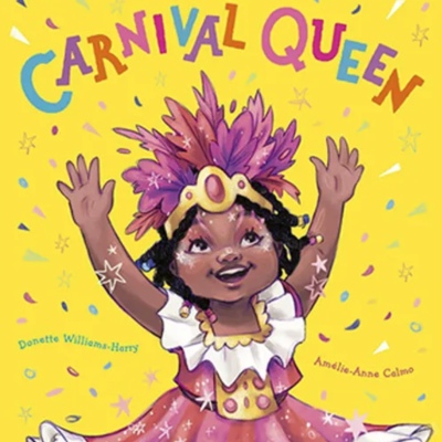 Little girl smiling in her Carnival outfit.