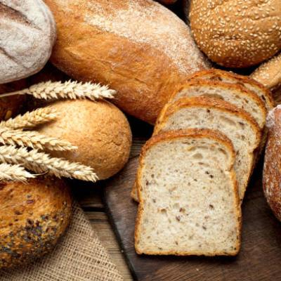 slices and loaves of bread in a pile