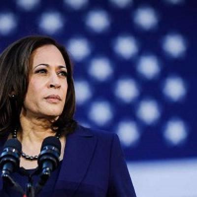 Kamala Harris against an American flag