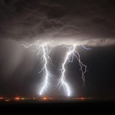 Lighting from a cloud at night.