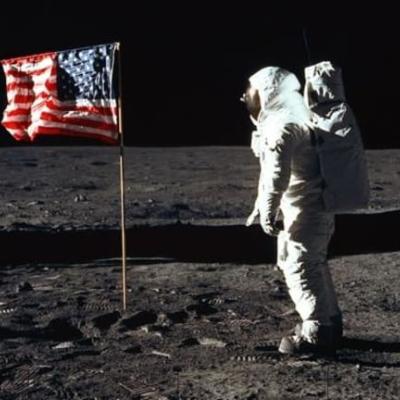 American flag and astronaut on the moon