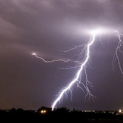 Lighting strike in a dark sky