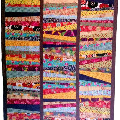 Strip quilt with colorful fabric