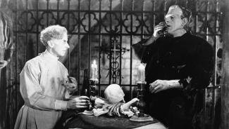 Victor Frankenstein (Ernest Thesiger) and the Monster (Boris Karloff) in the 1935 film Bride of Frankenstein, directed by James Whale